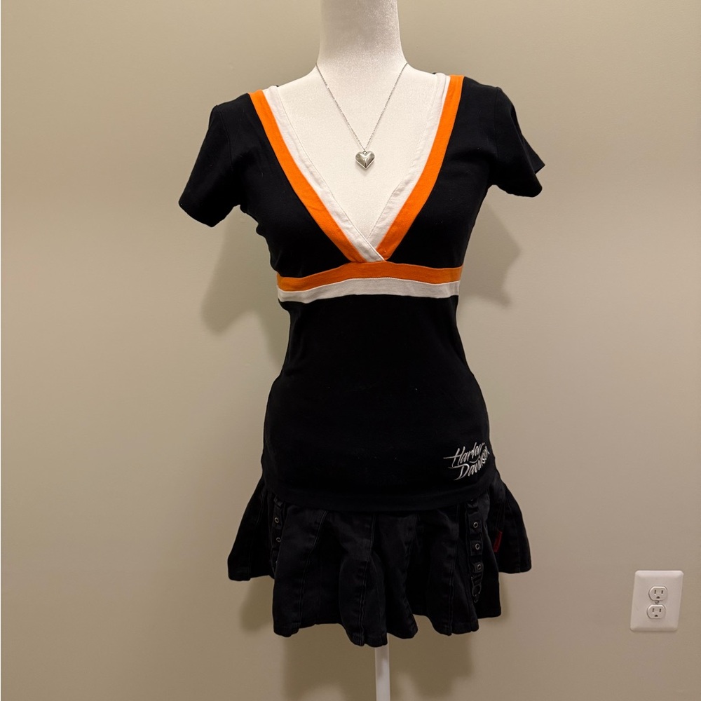 Harley Davidson orange white and black v neck top. Size M